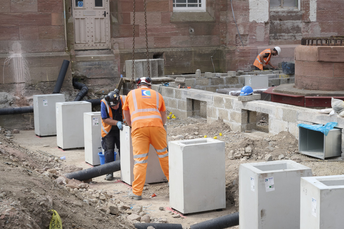 
    Installation of the permanent casing to hold the concrete columns
    