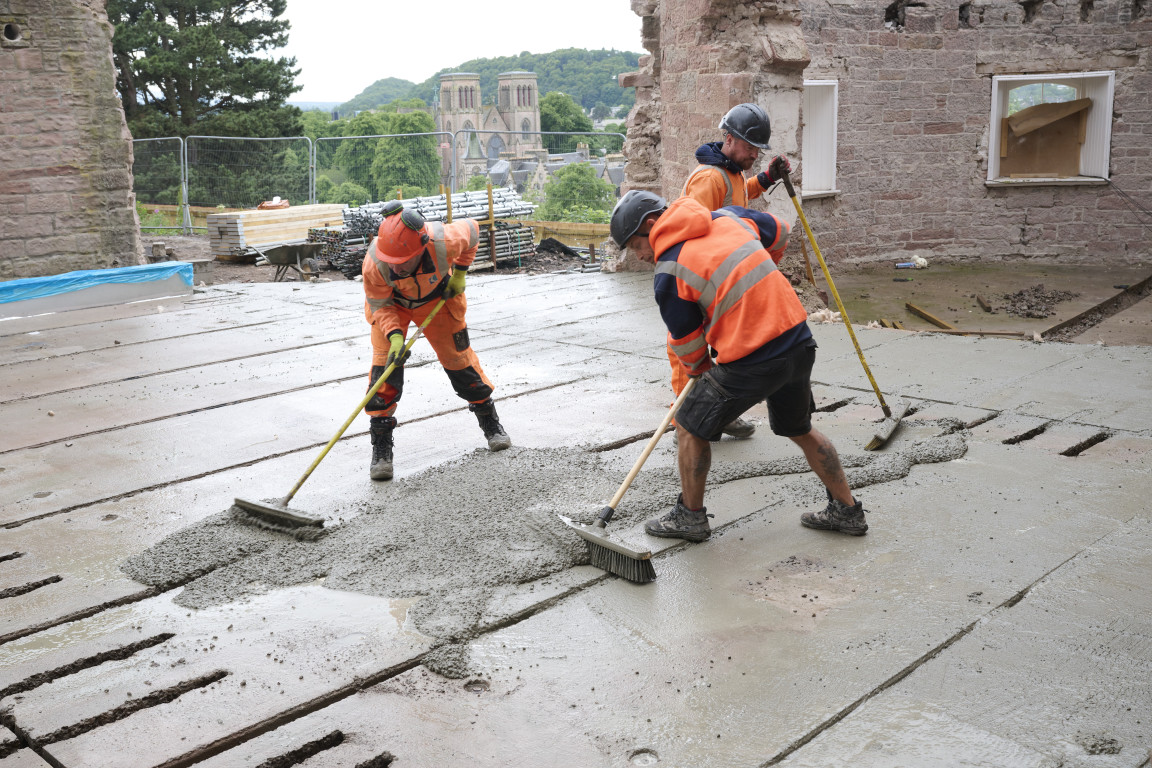 
    Brushes are used to fill the gaps with cement
    