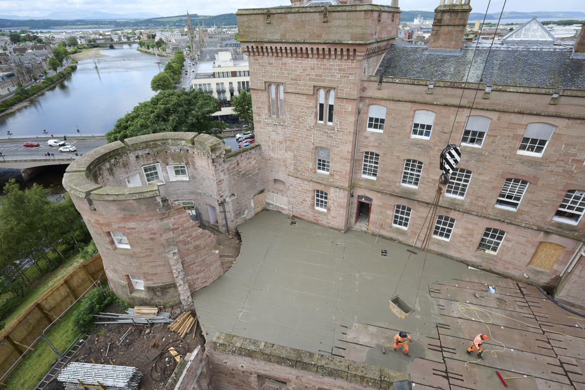 
    An opening into the circular West Tower
    